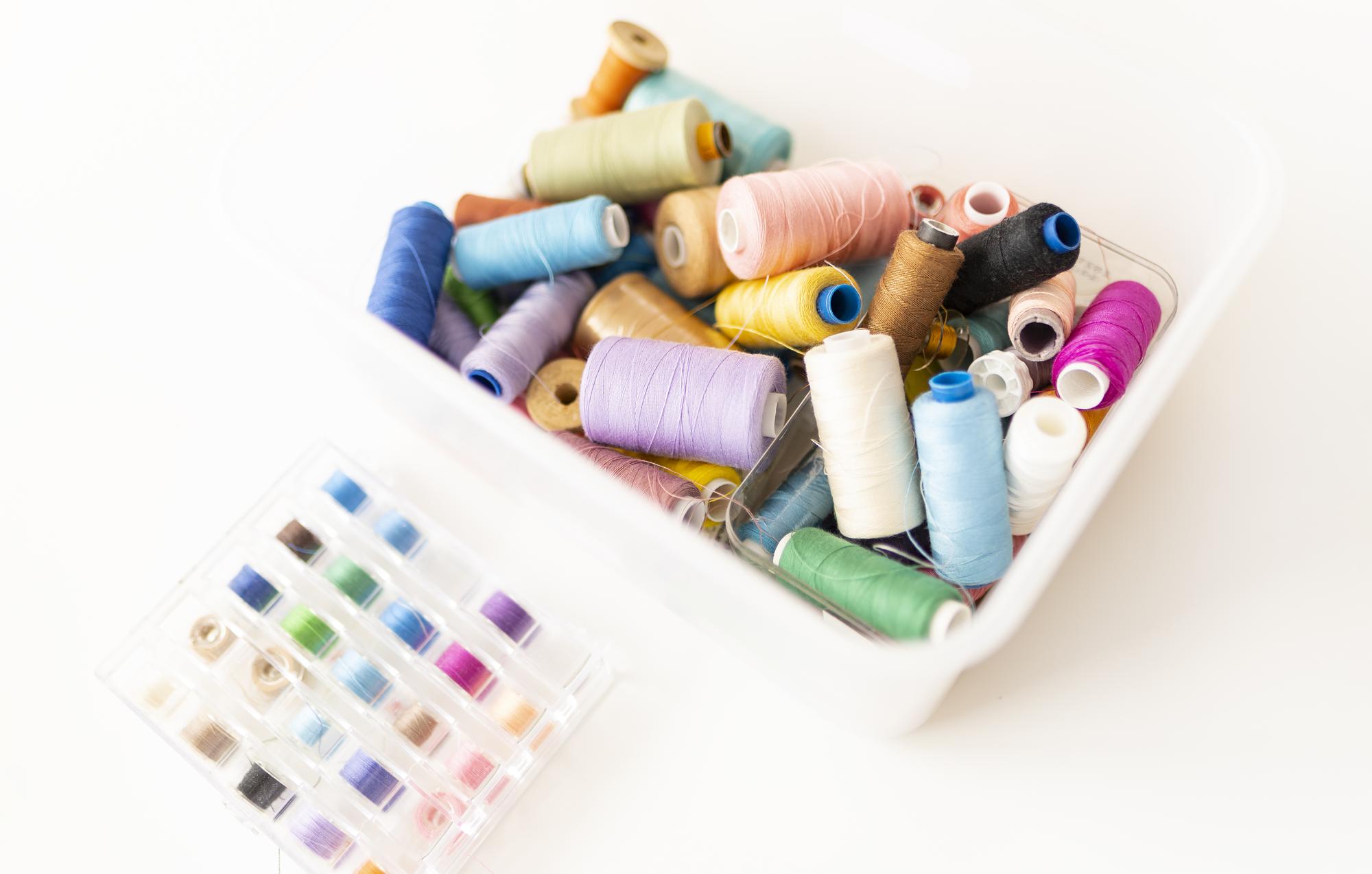 Kits and threads arranged for a workshop